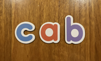 The letters 'c', 'a' and 'b'