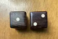 Two dice. The first with the 1 side up, the second with the 2 side up