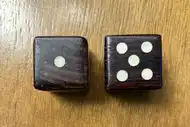 Two dice. The first with the 1 side up, the second with the 5 side up