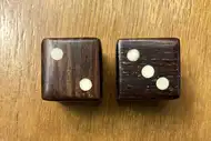 Two dice. The first with the 2 side up, the second with the 3 side up