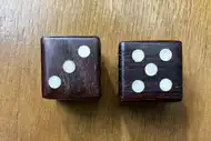 Two dice. The first with the 3 side up, the second with the 5 side up
