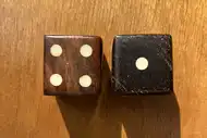 Two dice. The first with the 4 side up, the second with the 1 side up