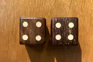 Two dice. The first with the 4 side up, the second with the 4 side up