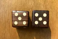 Two dice. The first with the 5 side up, the second with the 5 side up
