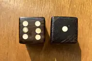 Two dice. The first with the 6 side up, the second with the 1 side up