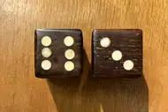 Two dice. The first with the 6 side up, the second with the 3 side up