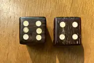 Two dice. The first with the 6 side up, the second with the 4 side up